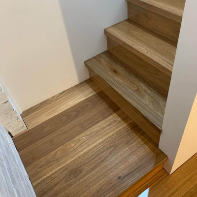 Staircase featuring engineered timber flooring used on stairs
